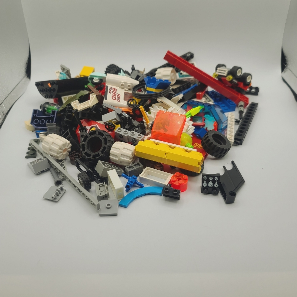 Lego - just over one pound of misc lego pieces. No regular bricks. See desc